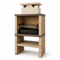 Barbecue in pietra con griglia in acciaio inox